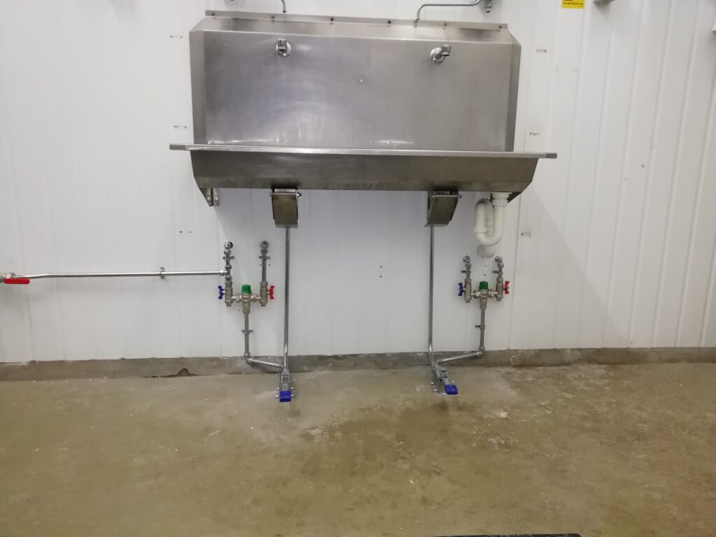 Installation of foot operated controls at wash stations